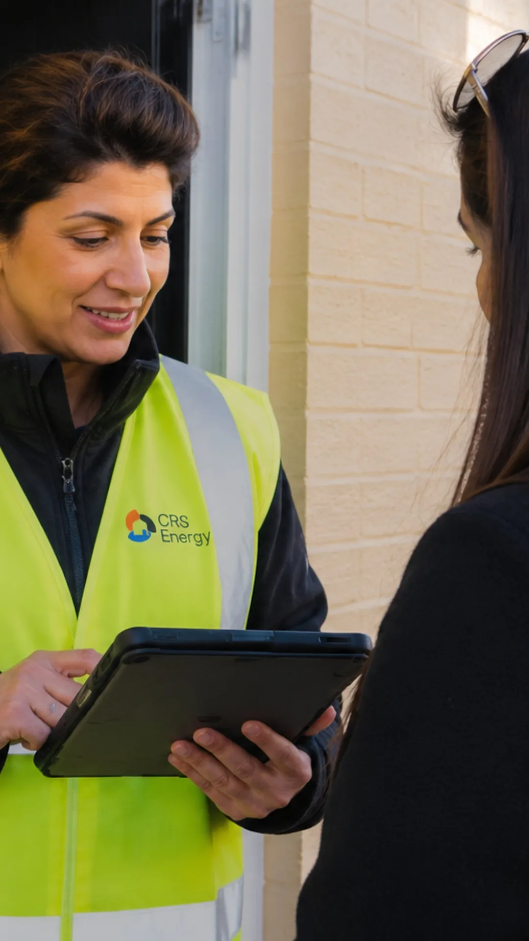 CRS surveyor recording inspection findings with a thermal camera and tablet